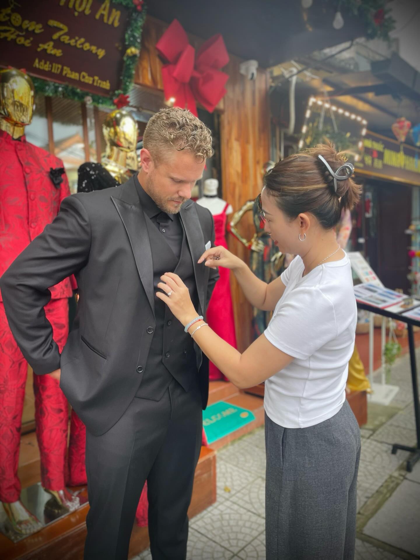 Tailoring suits at Custom Tailory, no need to worry about what to buy in Hoi An.